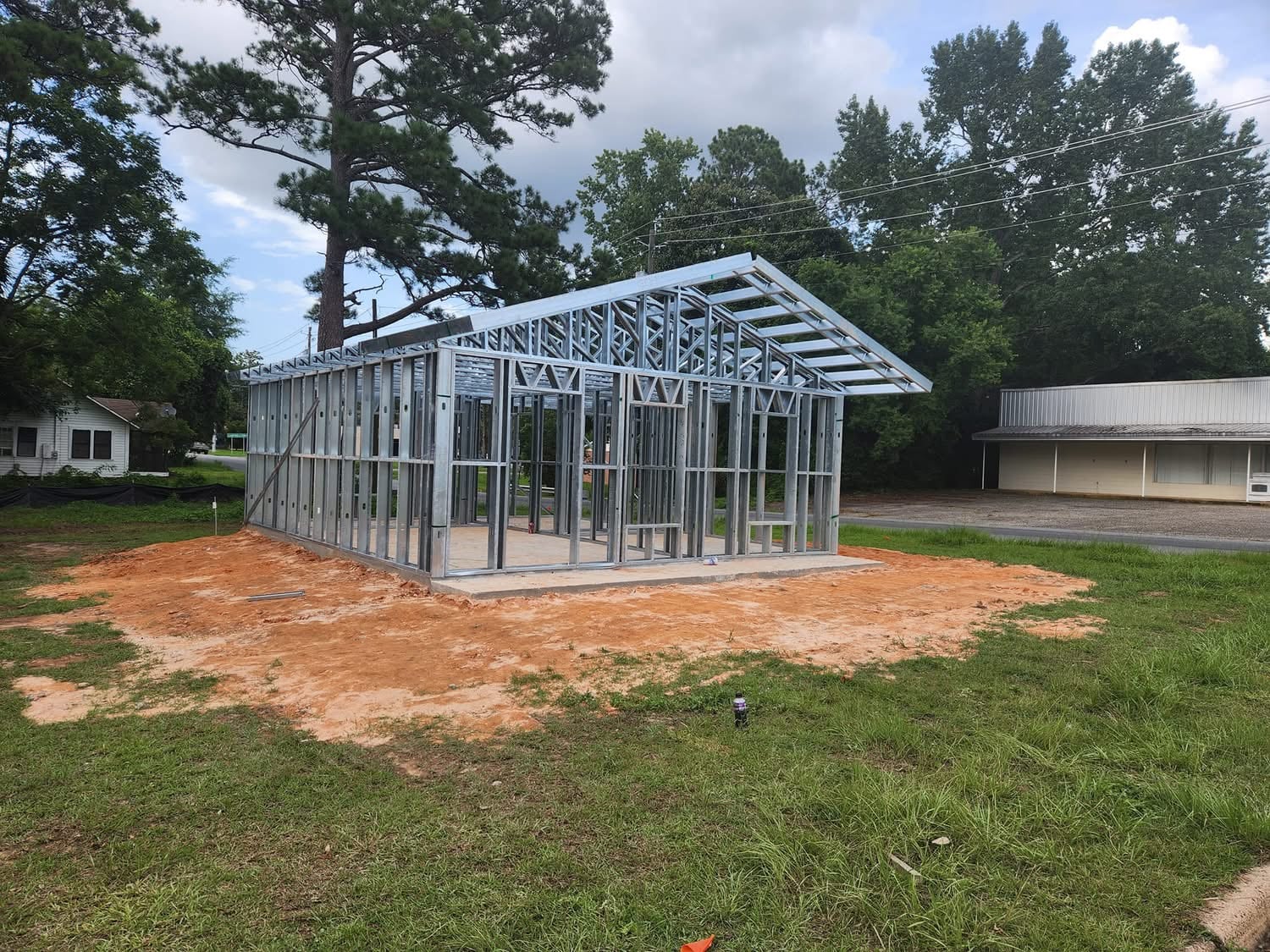 Steel barndominium frame with pitched roof in Texas